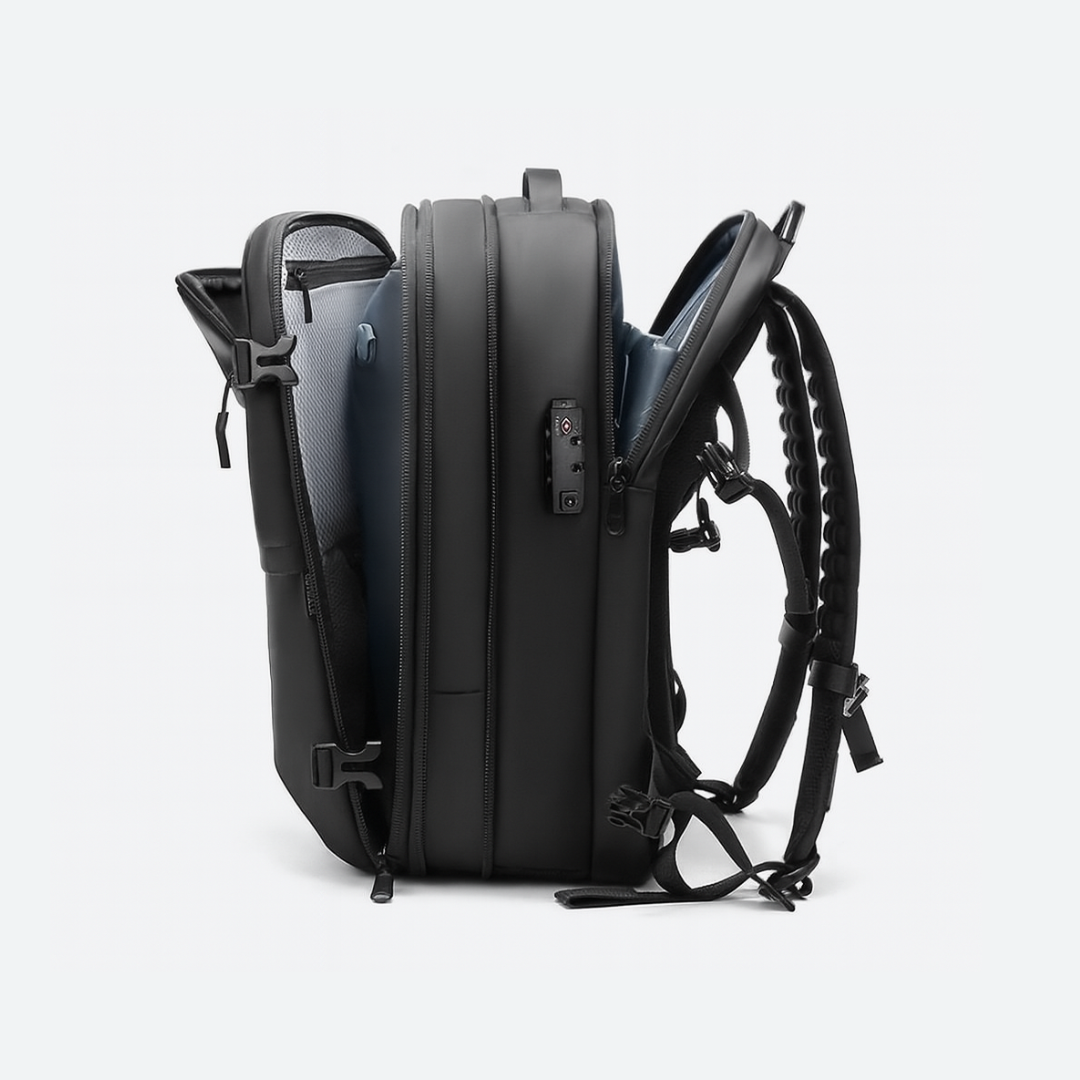 Dependz 7705 Black backpack with multiple straps on a light gray background