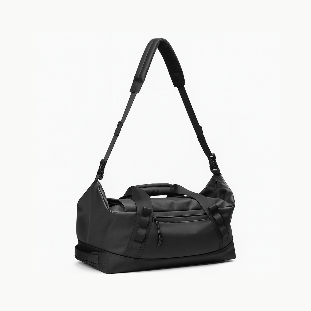 Dependz AL607 Black duffel bag with a shoulder strap on a white background